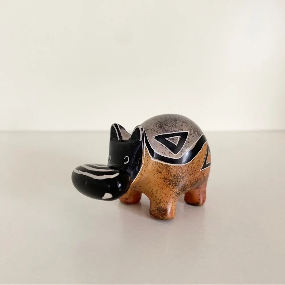 Stone hippo statuette